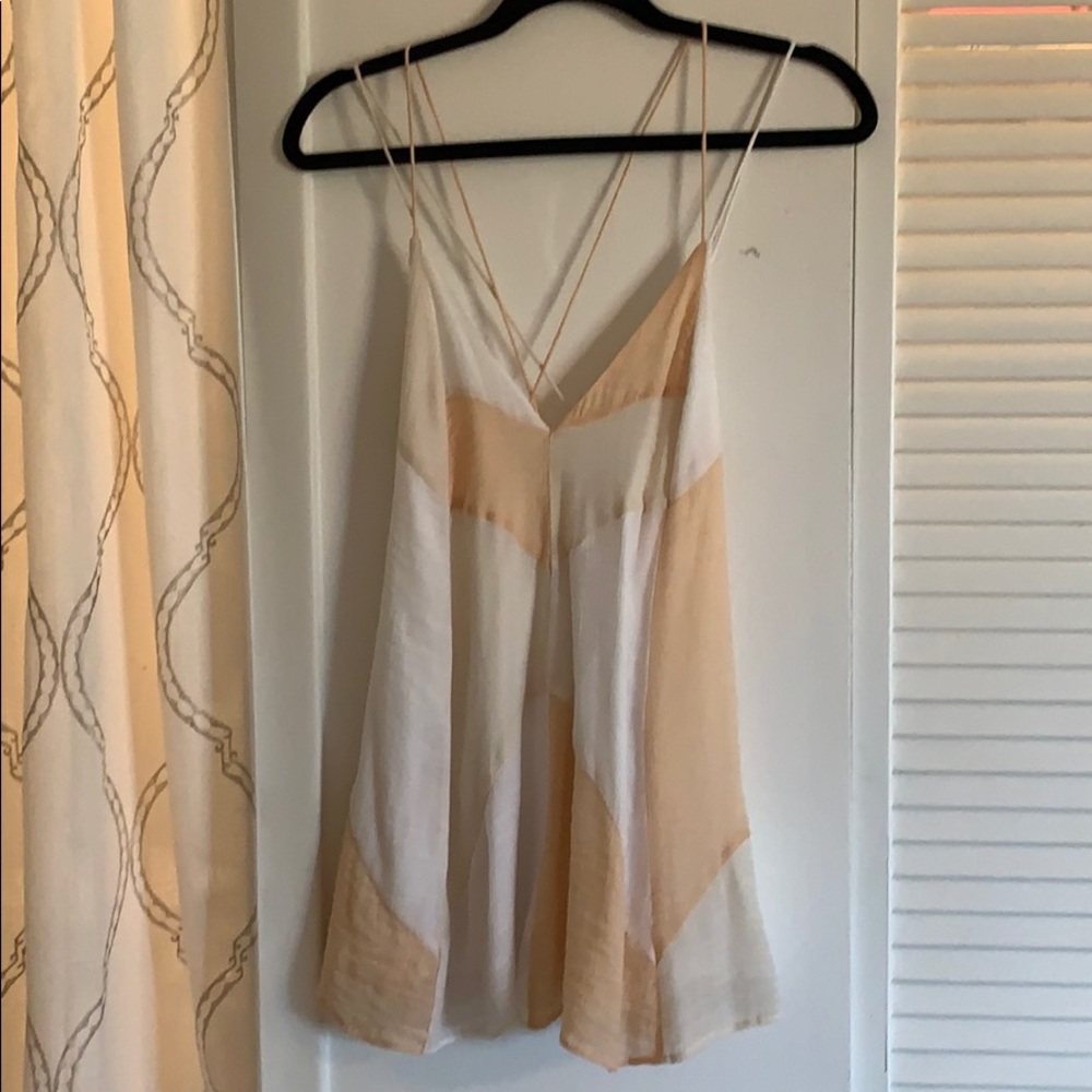 Flowing Line  Tank Top w/ Cross Strap Design